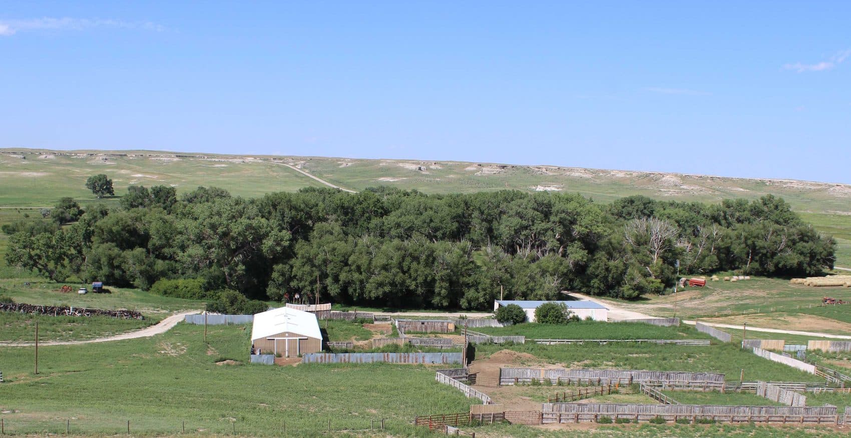 Ranch headquarters, river bottom, and bluffs from Windmill Hill